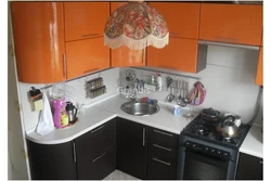 Corner kitchens for a small kitchen photo with a refrigerator and stove