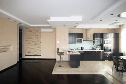 Laminate In The Living Room And Tiles In The Kitchen Photo