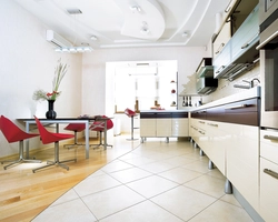 Laminate In The Living Room And Tiles In The Kitchen Photo