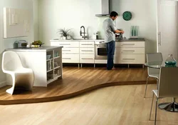 Laminate in the living room and tiles in the kitchen photo
