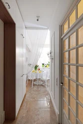 Corridor leading into the kitchen without doors design photo