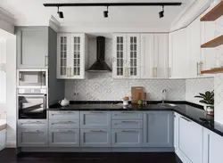 Gray Kitchen With Dark Countertops In The Interior Photo