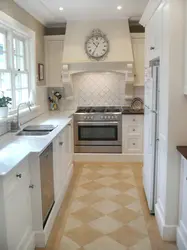 Design of a narrow kitchen with a window on the entire wall