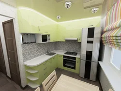 Interior Of A Small Kitchen With A Refrigerator Photo