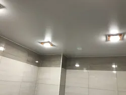 Lamps in the suspended ceiling in the bathroom photo