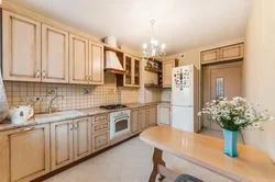 Beige wooden kitchen in the interior