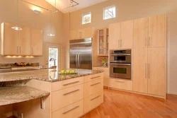 Beige wooden kitchen in the interior