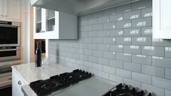 Кирпичики в интерьере кухни фартук