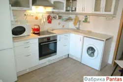 Design of a small corner kitchen with a refrigerator and washing machine