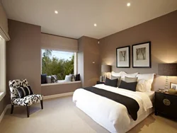 Bedroom walls with brown furniture photo
