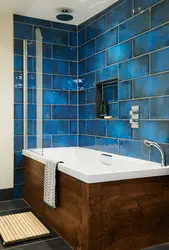 Bathtub made of cheap tiles photo