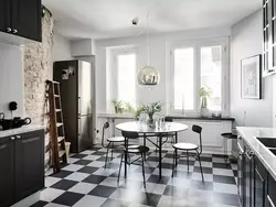 White walls and white floor in the kitchen interior