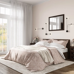Photo of a bedroom with a dark bed