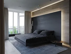 Photo Of A Bedroom With A Dark Bed