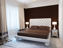 Photo Of A Bedroom With A Dark Bed