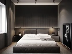 Photo of a bedroom with a dark bed