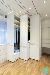 Photo of a bathroom cabinet up to the ceiling