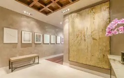 Decorative plaster wet silk in the interior of the hallway photo