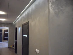 Decorative plaster wet silk in the interior of the hallway photo