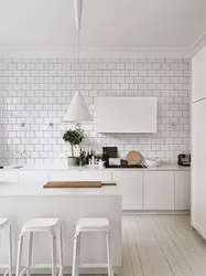 Kitchen design with white tiles
