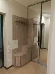 Wardrobe In A Small Hallway With A Mirror Photo