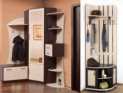 Wardrobe in a small hallway with a mirror photo