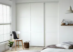 White wardrobe for bedroom photo design