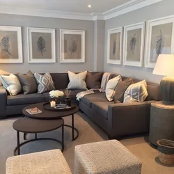 Living room with dark sofa design photo