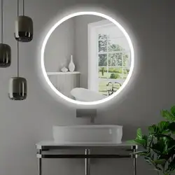 Bathtub with round mirror photo
