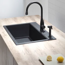 White sink in the kitchen interior