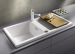 White sink in the kitchen interior