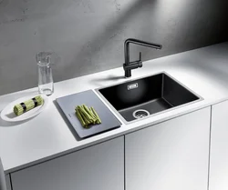 White sink in the kitchen interior