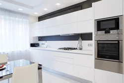 White glossy kitchens in a modern style interior photo