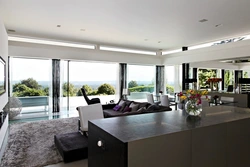 Kitchen living room with panoramic windows in the house design photo