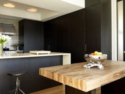 Black kitchen tables in the kitchen interior