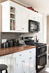 Дизайн кухни с черной плитой