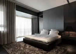 Dark wall color in the bedroom photo