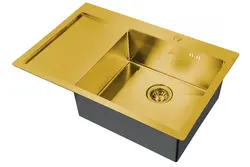 Golden sink in the kitchen interior