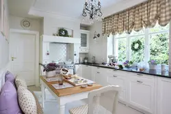 Interior window in the kitchen in Provence style
