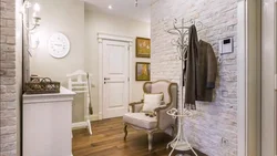 Wall with bricks in the interior in the hallway