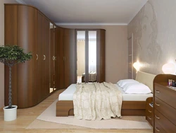 Bedroom interior design with corner wardrobe