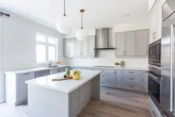 Light gray tiles in the kitchen interior