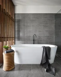 Gray Tiles On The Floor Walls In The Bathroom Photo
