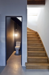 Bathroom design under the stairs photo