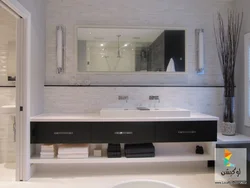 Hanging cabinets in the bathroom with a sink photo