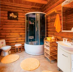 Interior of a bathroom with shower in a wooden house