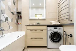 Bath toilet photo with washing machine