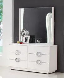 Chest of drawers with mirror in bedroom interior photo