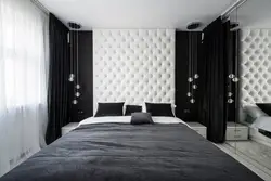 Curtains in the bedroom in the interior white wallpaper