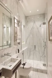 Bathroom design with marble tile shower